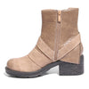 Inside side view mixed media grunge taupe bootie with side zipper